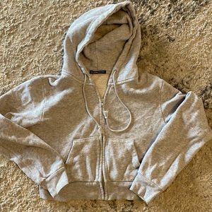 Brandy Melville gray zippered cropped hoodie.